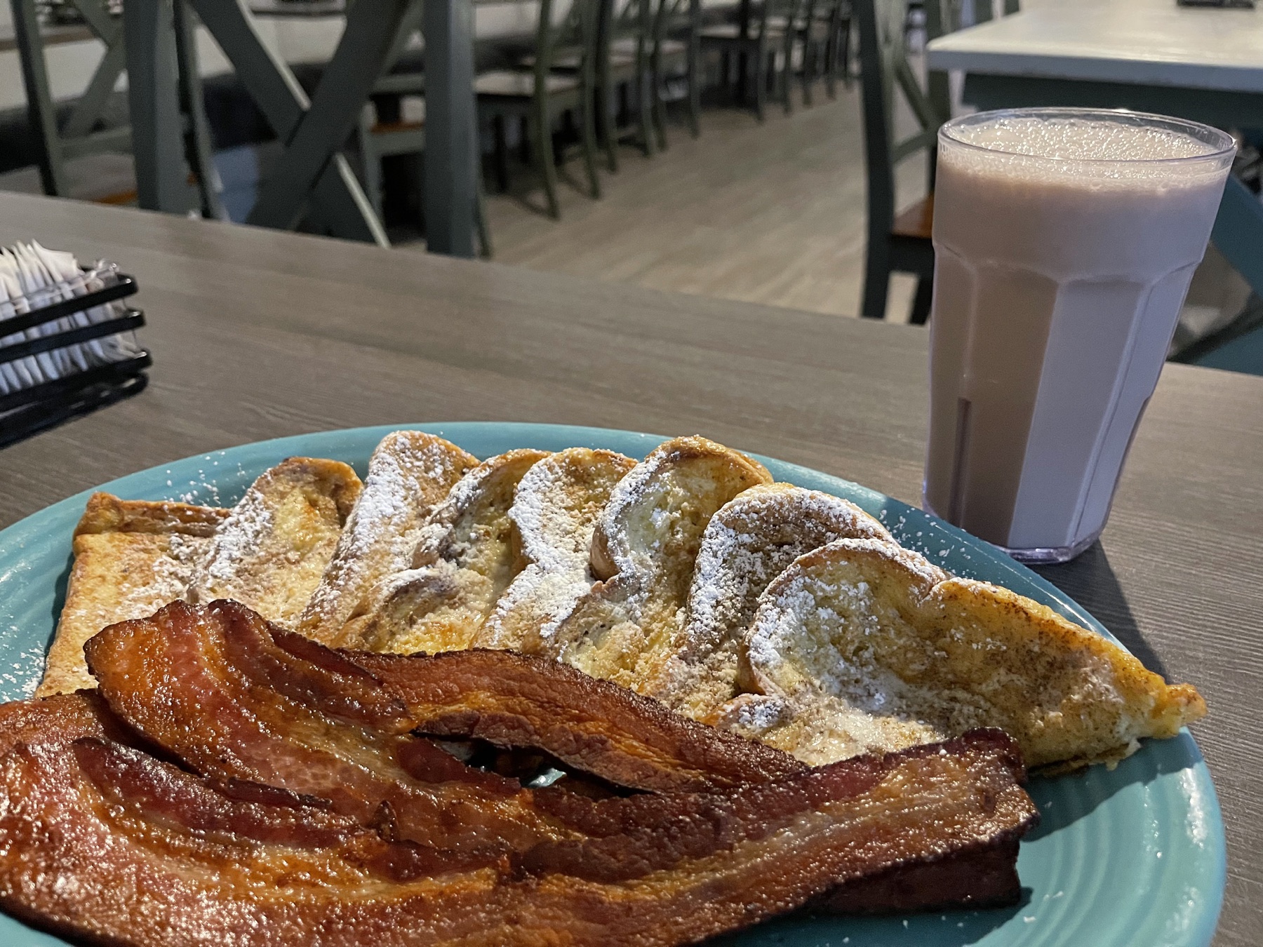 French toast with bacon and a chocolate drink